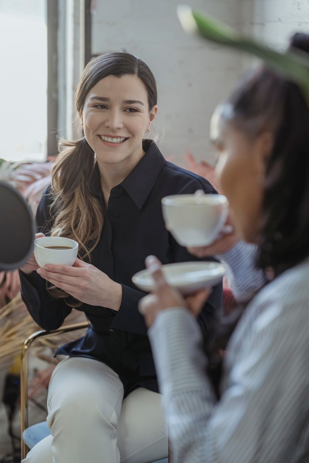 Friends chatting over coffee