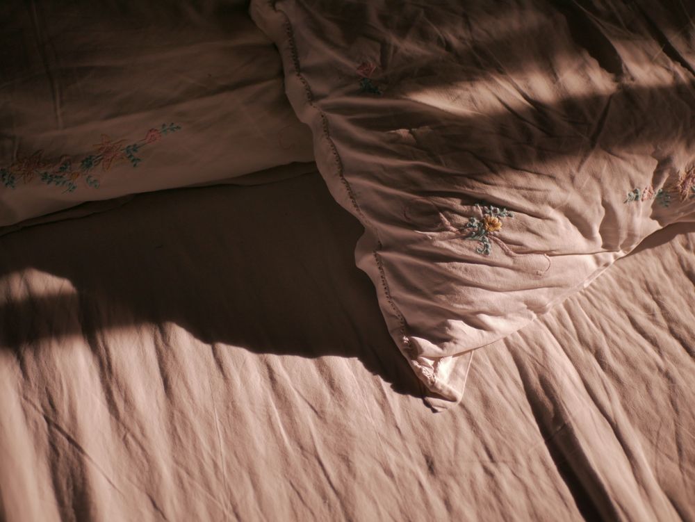 Soft daylight on pillows and bed linen