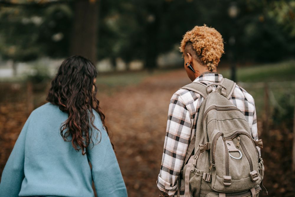 Friends walking together in a park
