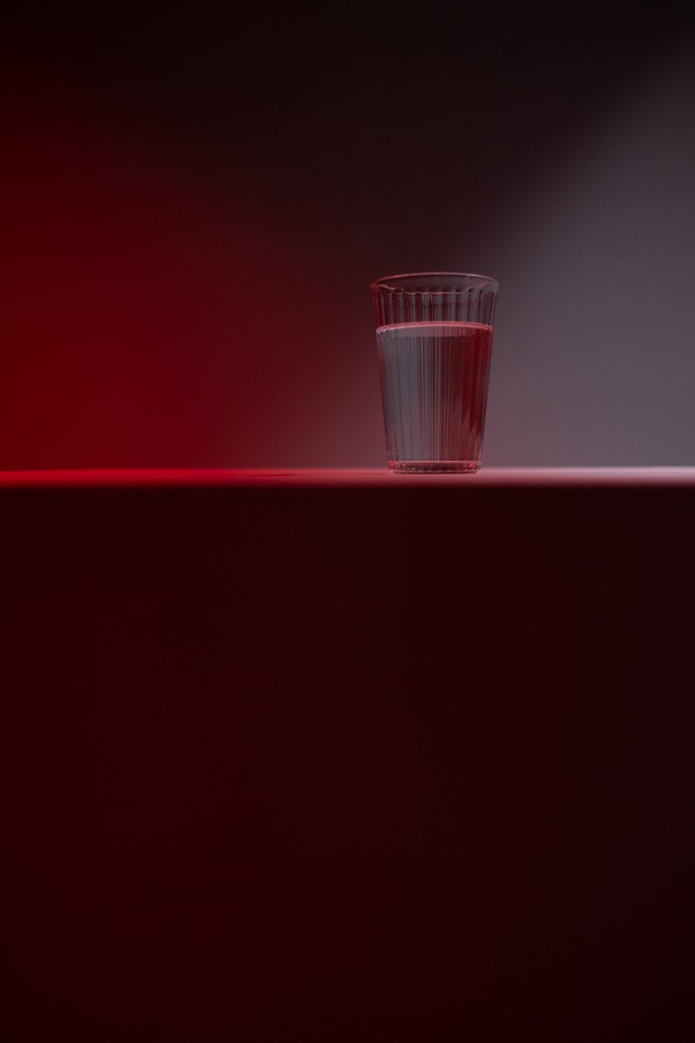 A glass of water on a table